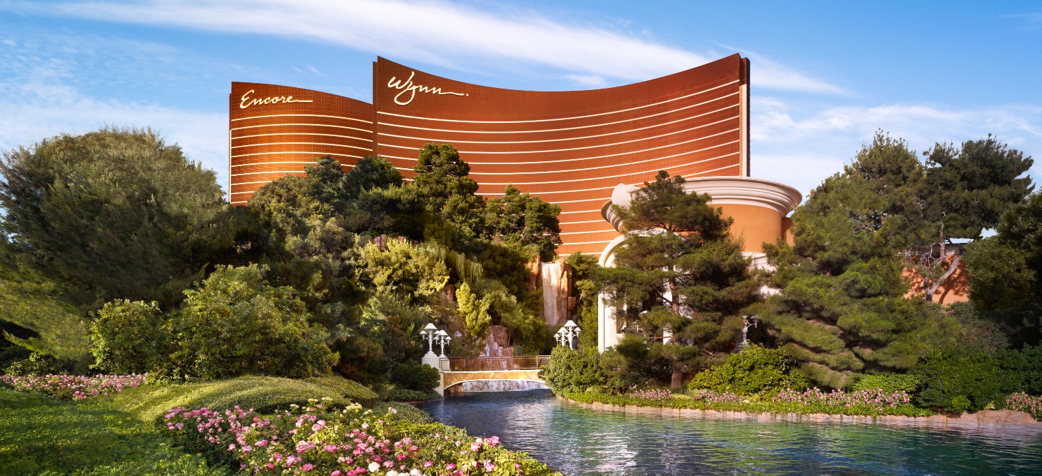 Wynn and Encore Las Vegas rising above landscaped resort gardens